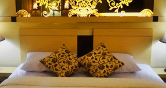 Srikandi Guesthouse Malang Værelse billede